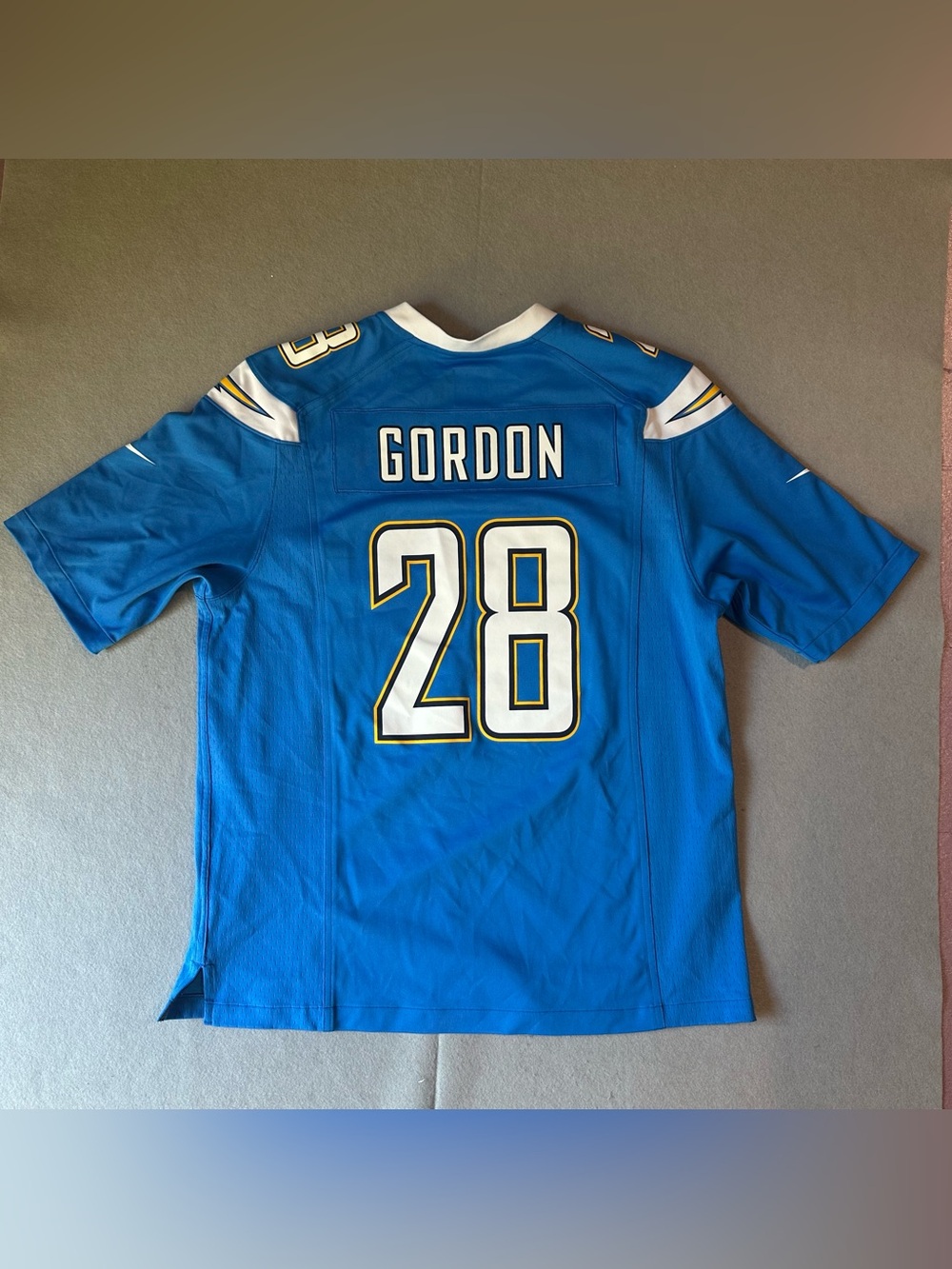 NFL Blue Gordon #28 Football Jersey with White and Gold Accents